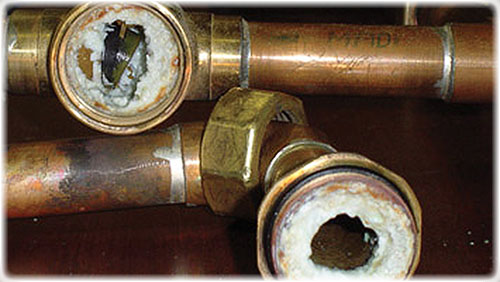 Approach to pipes affected by mineral encrustation due to encrusting water.